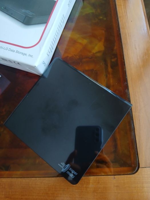 Външна записвачка Hitachi-LG+ подарък 3 бр. С по 10 нови дискове