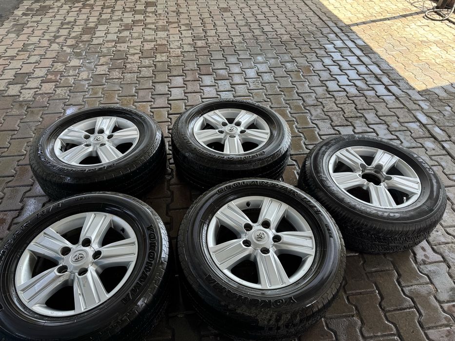 Продам автошины и оригинальными дисками от TLC 200