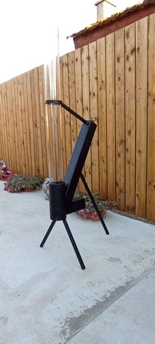 Ракетна печка на пелети с открит огън в стъклена тръба