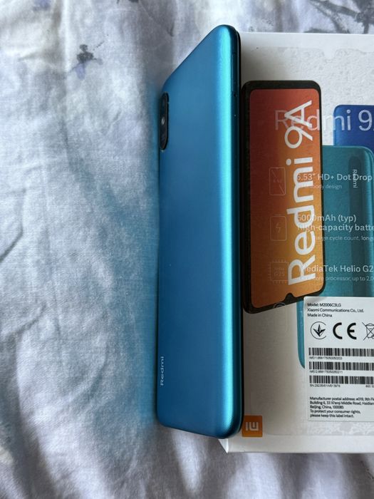 Redmi 9A 32 GB, комплект със зарядно и калъф
