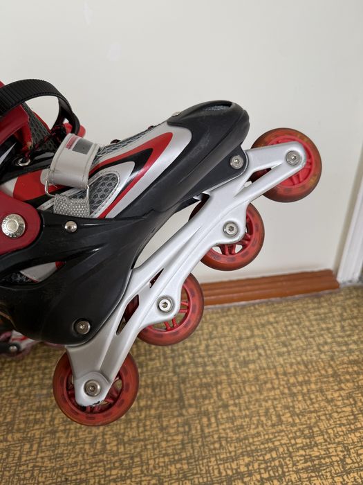 Роликовые коньки