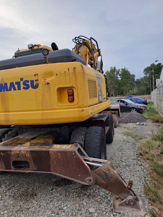 Vand cauciucuri 1000/20+ excavator Komatsu pw140 pe roti