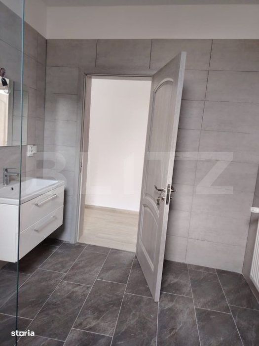 Casa de vanzare, cu 6 camere, 288 mp, zona Voinesti