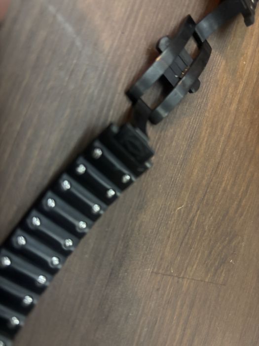 Curea metalica Santos Cartier.