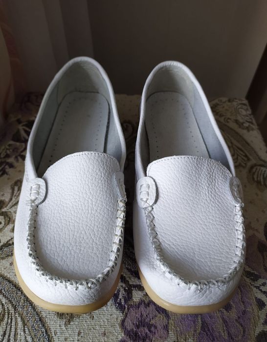 Новые кожаные туфли