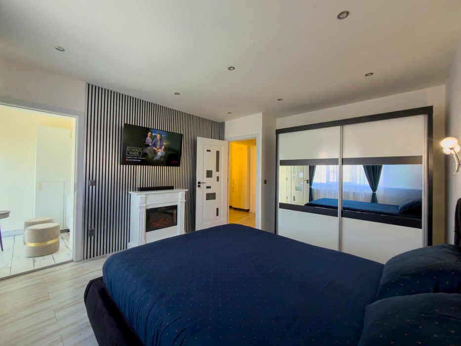 Cazare Hunedoara Garsoniera Ultramodernă TV 4K Șemineu Wifi Youtube Premium Netflix 4K Apartament 1 cameră regim hotelier deosebit! Zonă Centrală!