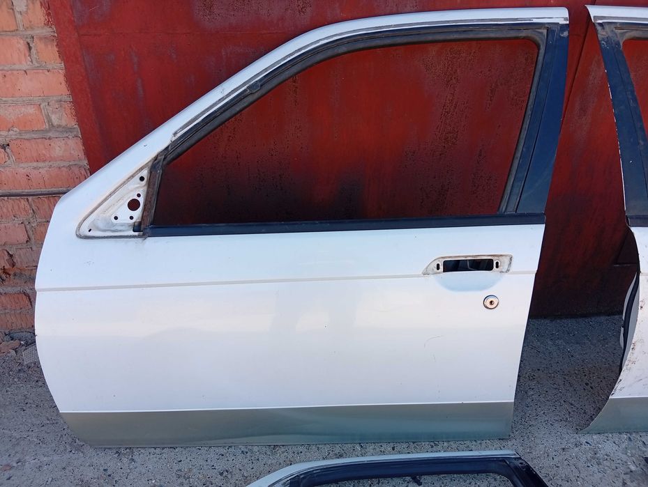 Двери Nissan Bluebird U14