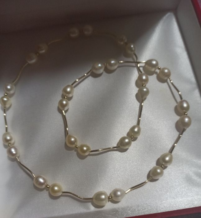 Жемчуг, колье с золотыми вставками. 60см.