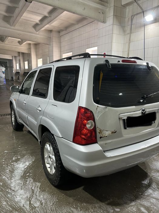Продам Mazda Tribure