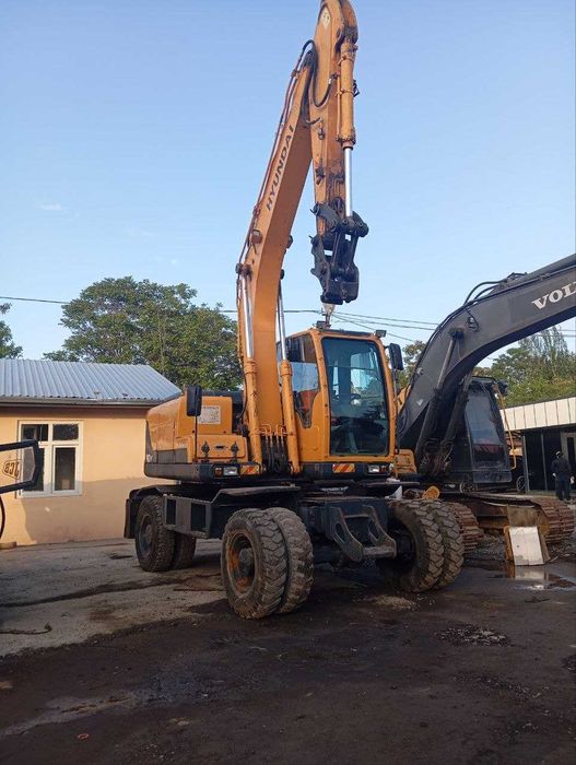 Экскаватор 140W Хундай сотилади