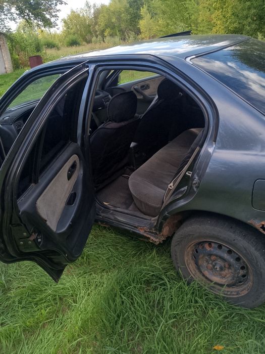 Нисан примера бензин