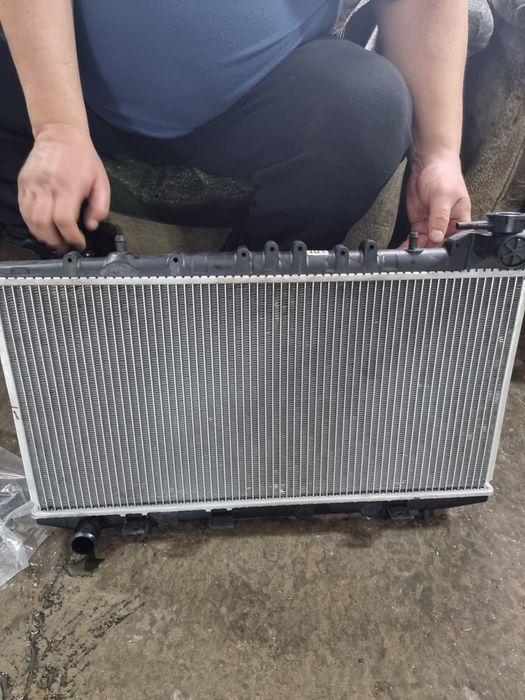 Радиатор Nissan Preria