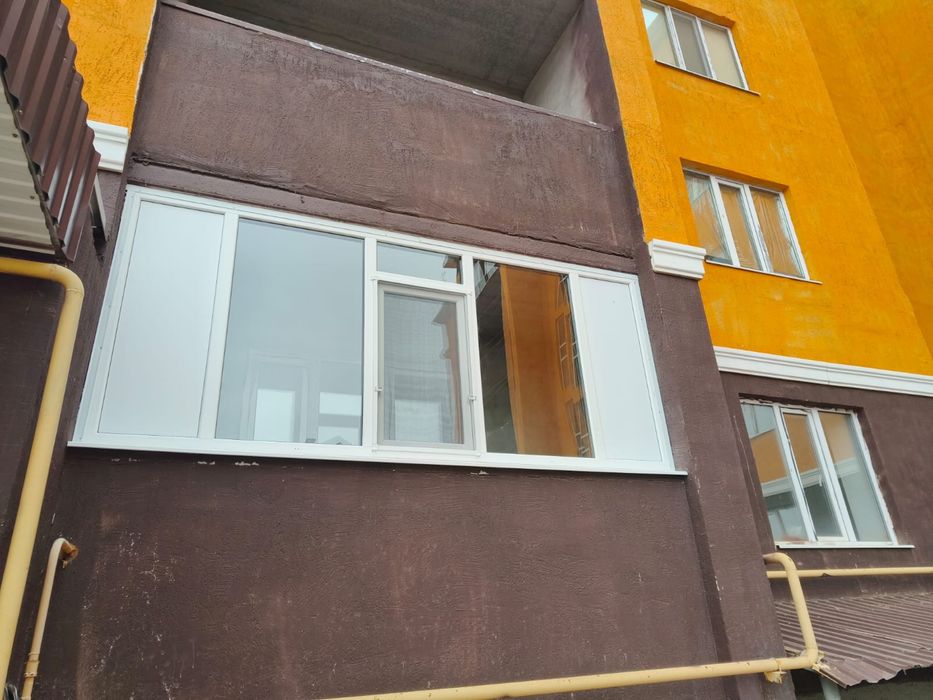 Пластиковые окна балконы