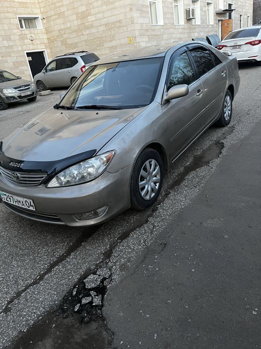 Тоиота камри ……………………….,………………………………………….