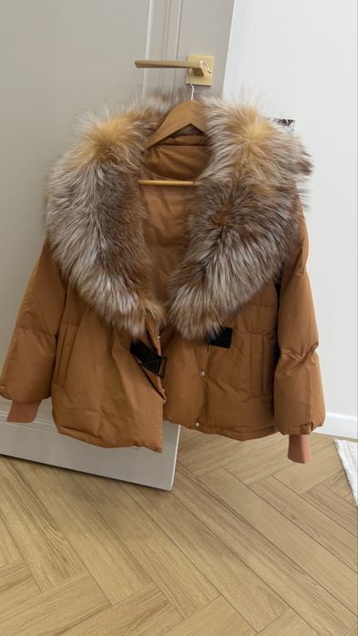 Продам зимний пуховик новый