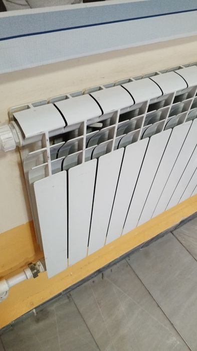 Отопление  радиатор
