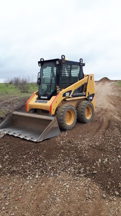 Багер,бобкат и самосвал