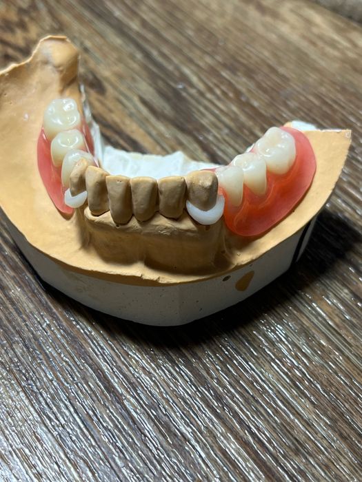 Зубной техник