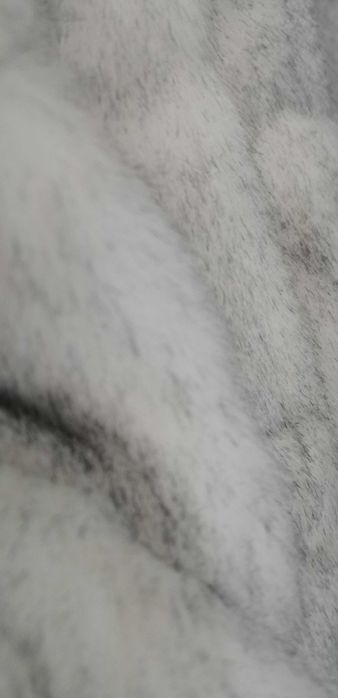 Дамско пухкаво елече