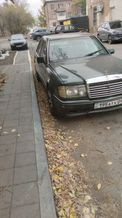 Мерседес Бенс  124