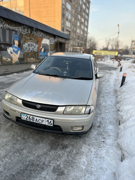 Продам машину mazda familia