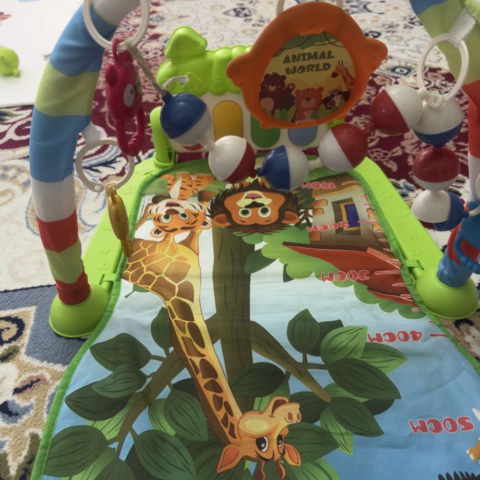 Продам развивающий коврик с пианино