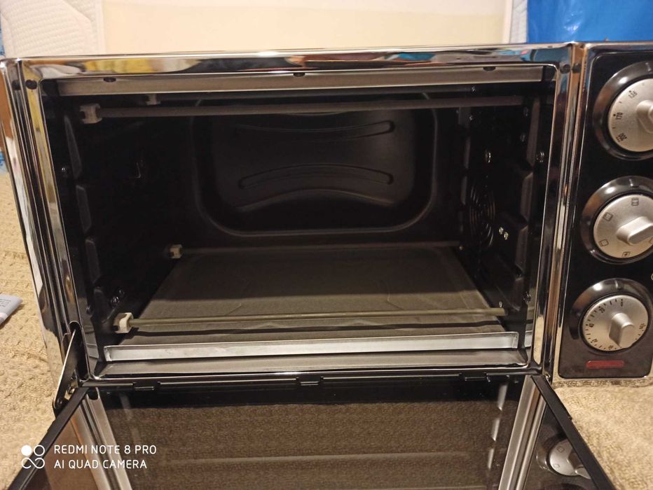 Cuptor electric Delonghi, 20 litri, 7 functii de gatit, 1300W. (NOU)