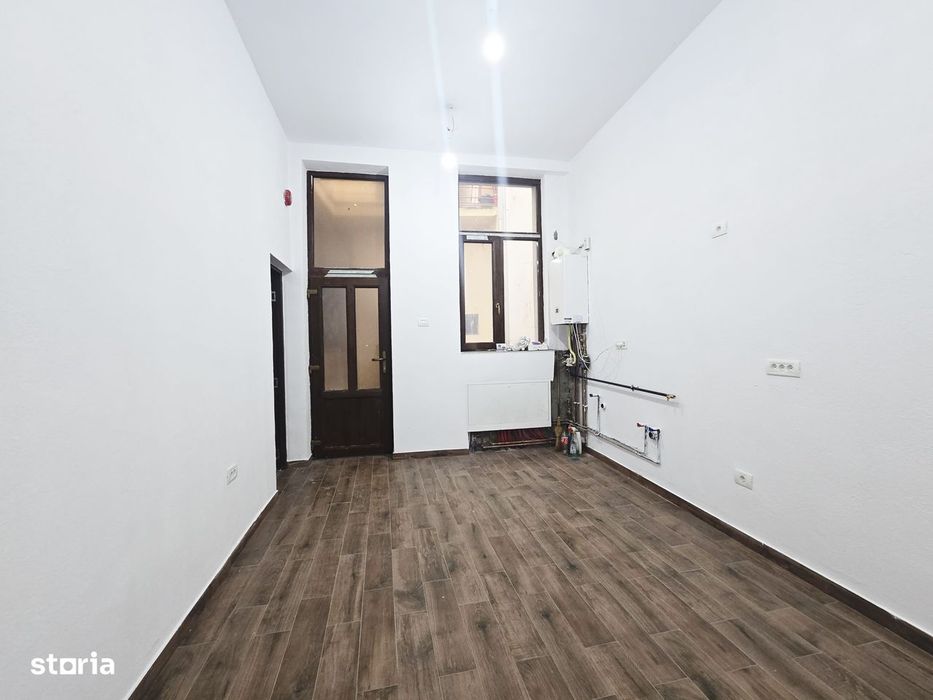 Apartament 3 camere cu centrală, parter – zonă centrală — fotografia 2