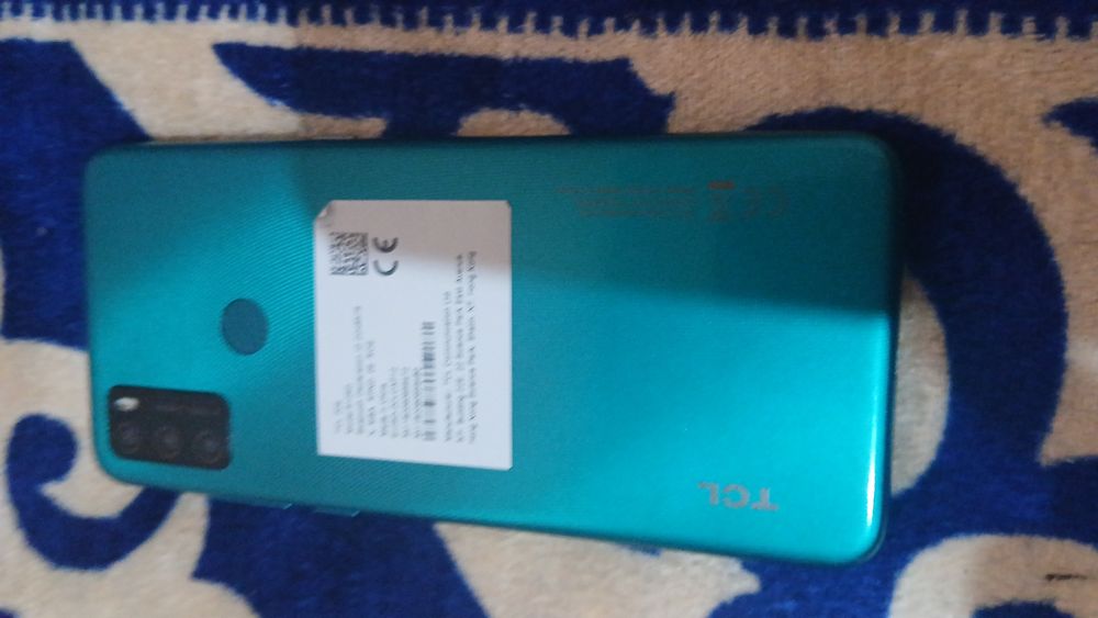 TCL telfon 32 li xolati zur aybi yuq