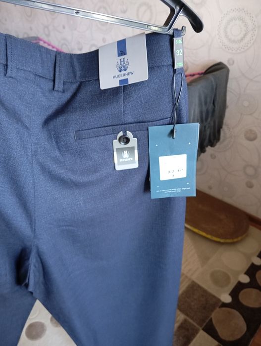 Продам брюки новые