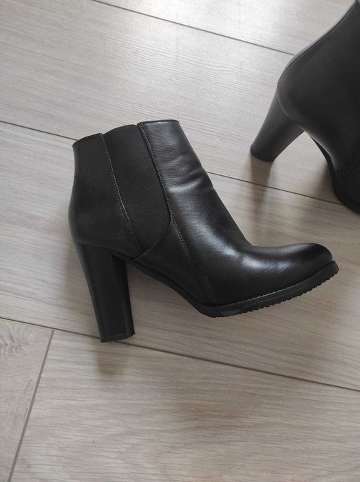 Сапоги на каблуках