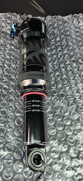 Заден шок/амортесьор ROCKSHOX DЕLUXE ULTIMATE RCT 210X55 DebonAir захват две уши НОВ
