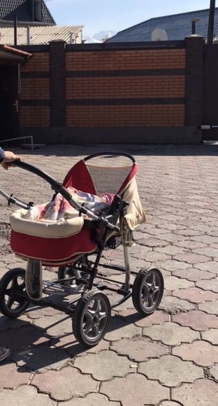 Коляска люлька на ремнях