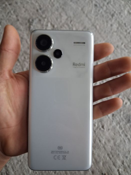 Xiaomi HyperOS ..