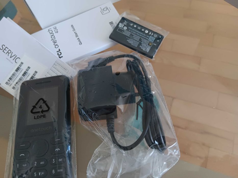 Мобилен телефон TCL onetouch Нов