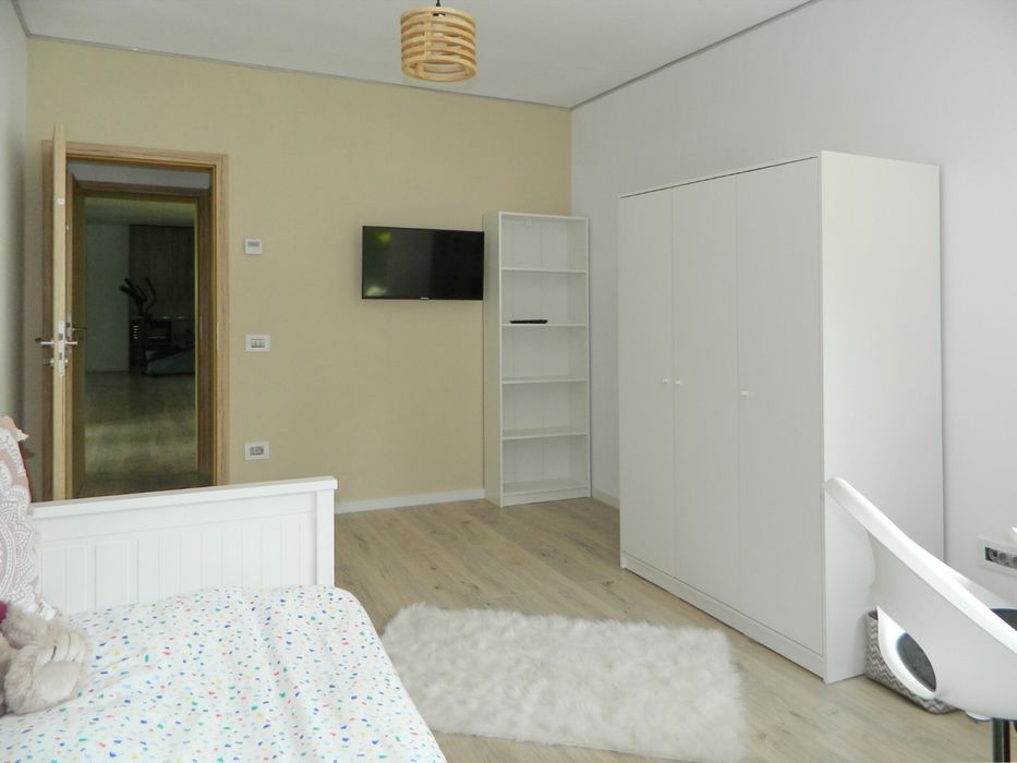 Apartament in vila cu teren propriu
