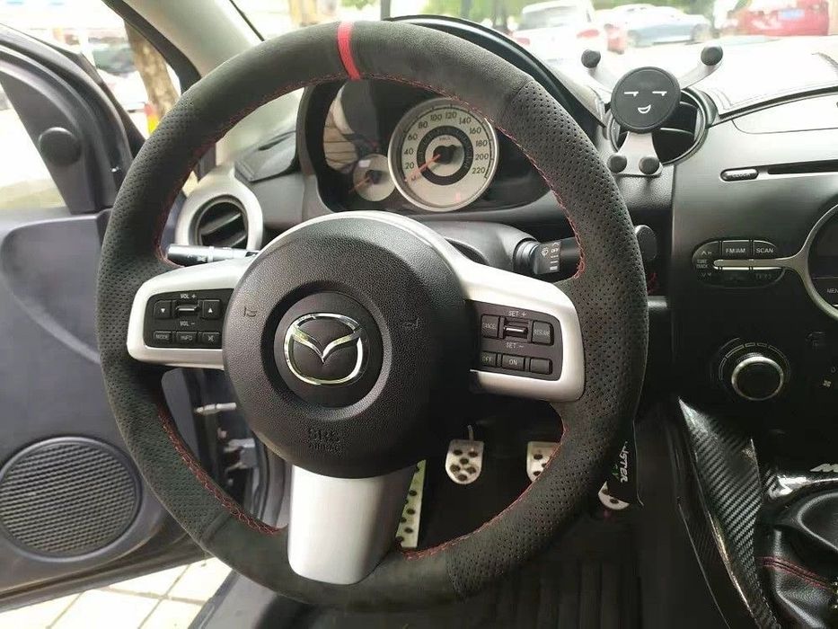 Перетяжка оплетка руля авто