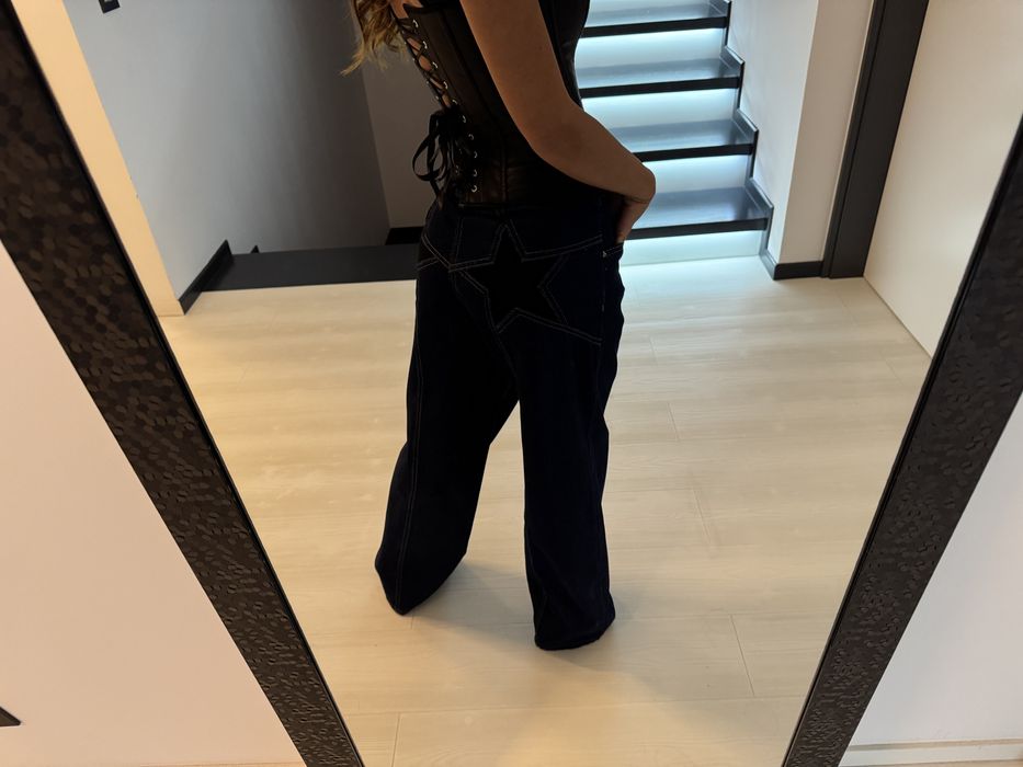 Jeansi stele pe fund