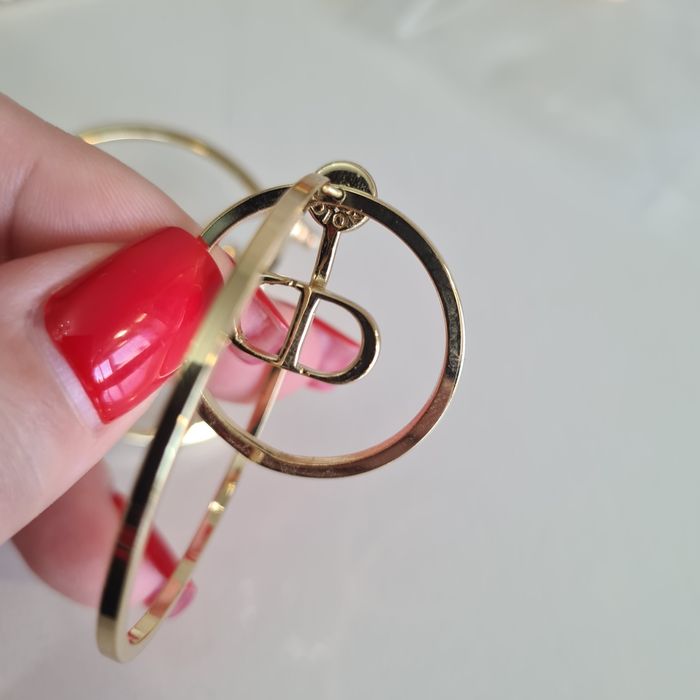 Серёжки от Dior и Louis Vuitton