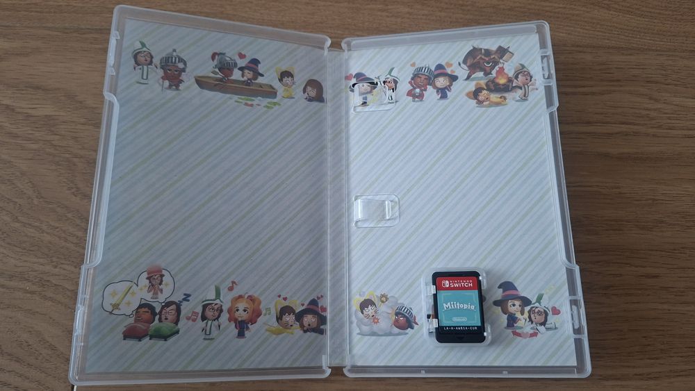 Nintendo Switch OLED White + игра Miitopia