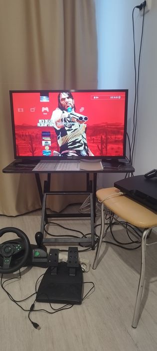 PS 3 modat  + Volan gaming (în garanție);(31 jocuri)   550 roni neg.