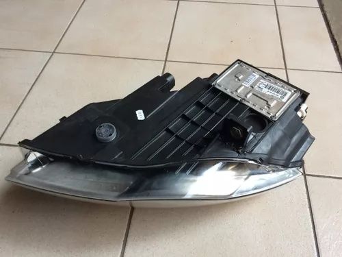 Far bixenon Original passat b6 complet partea dreapta