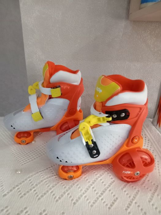 Раздвижные роликовые коньки