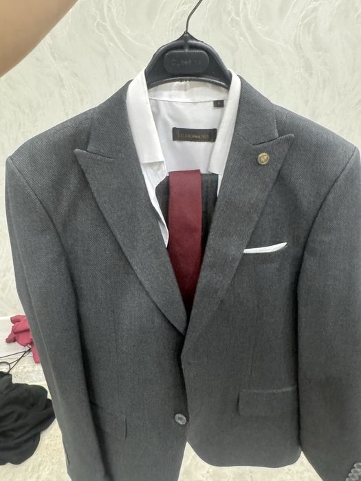 Костюм почти новый