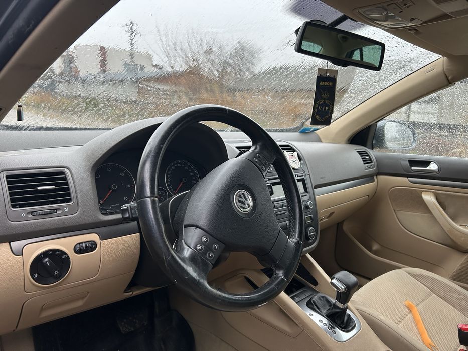 Volan din piele cu comenzi si padele  volkswgen Jetta 2007