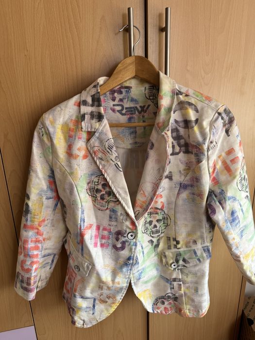 Дамско сако с ефектен десен