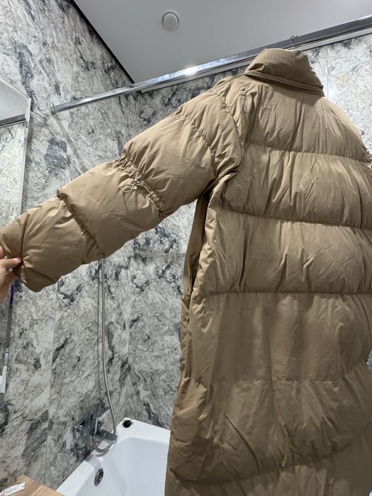 Продам пуховик бедевого цвета