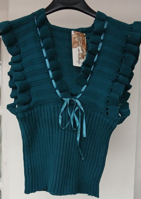 Дамски болера и жилетки.