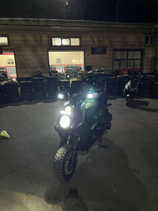 Irbis skutr Rangi qora matvi