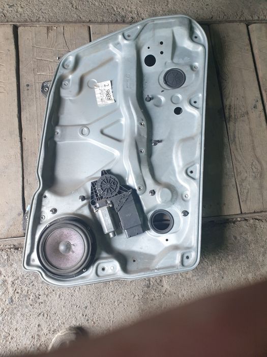 Стеклоподьемник оригинал VW B5 "дельфин"